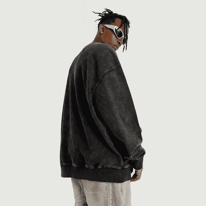 model wearing xtra kitti black oversized sweatshirt and sunglasses 