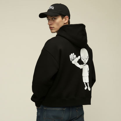 Model wearing black hoodie - back view looking over shoulder