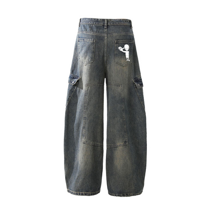 black distressed jeans with xTra graphic on the pocket 